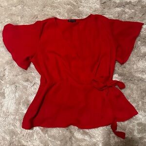 Woman’s red blouse size large front tie 100% rayon